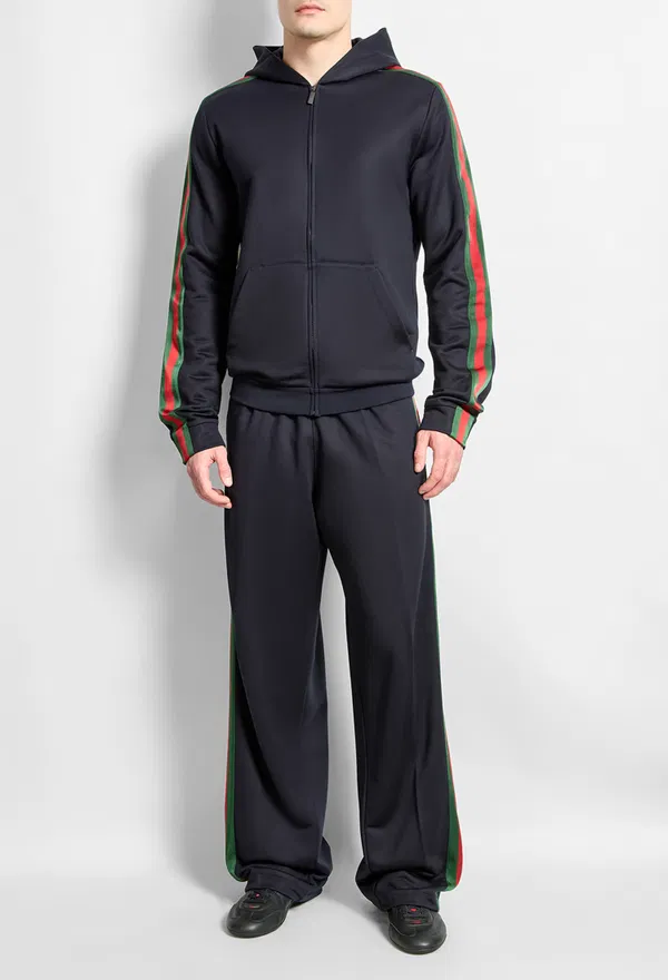 Шелковые спортивные брюки Gucci 866170 226/9CQ Купить