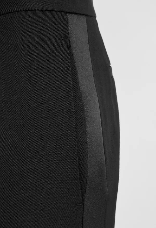 Шерстяные брюки JW Anderson TR0376 224/9H2 фото