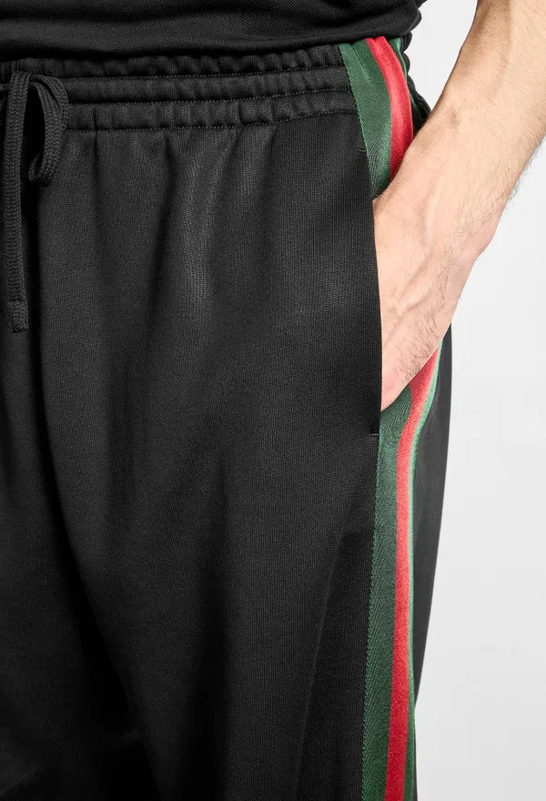 Шовкові спортивні штани Gucci 866170 226/9C2 фото