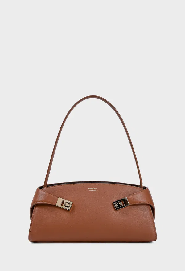 Кожаная сумка HUG EAST-WEST SHOULDER  FERRAGAMO 21A712 226/0A3 Купить