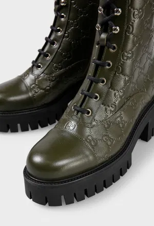 Кожаные ботинки Gucci 840739 225/0CH в Украине
