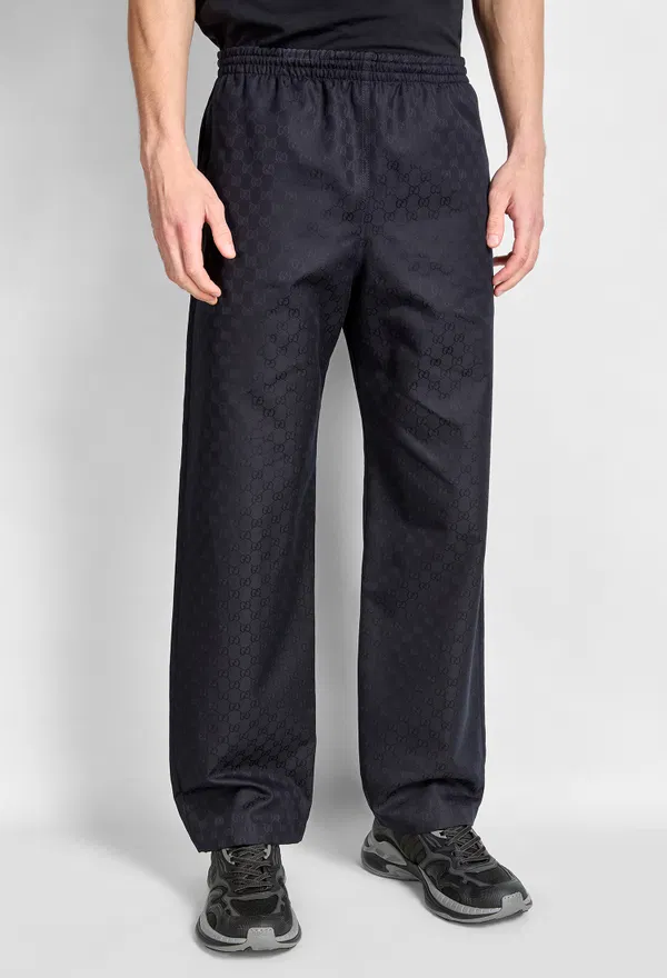 Темно-синие брюки Gucci 871976 226/9AQ в Украине