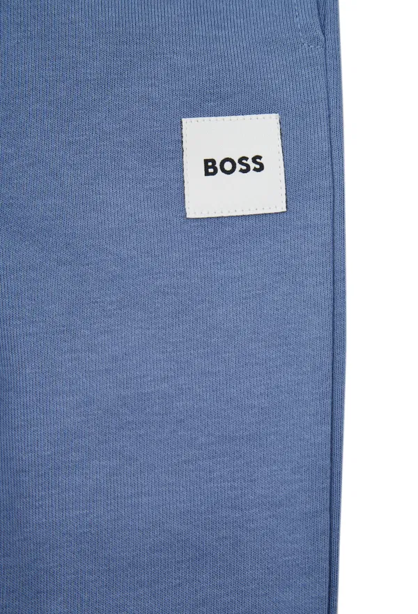 Дитячі блакитні спортивні штани Boss J52853 126/9G в Україні